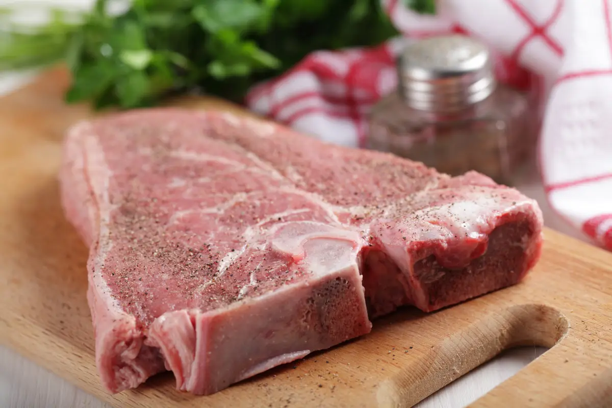 How do you prepare T-bone steak to perfection on the BBQ?